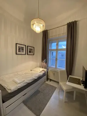 Ein Bett oder Betten in einem Zimmer der Unterkunft Seeblickperle, Business Zentrum Gmunden