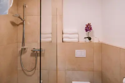 Ein Badezimmer in der Unterkunft Schärhaus