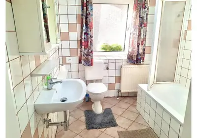 Ein Badezimmer in der Unterkunft Apartments Enser