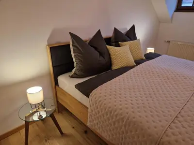 Ein Bett oder Betten in einem Zimmer der Unterkunft Ferienwohnung im Schlosshof