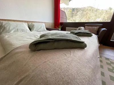 Ein Bett oder Betten in einem Zimmer der Unterkunft Ferienwohnung Jogginghose