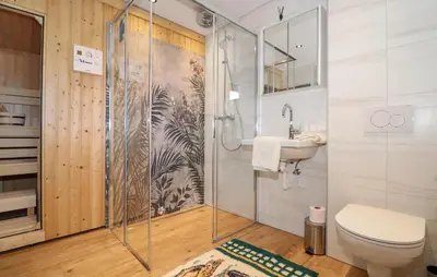 Ein Badezimmer in der Unterkunft Ferienhaus Mit Sauna