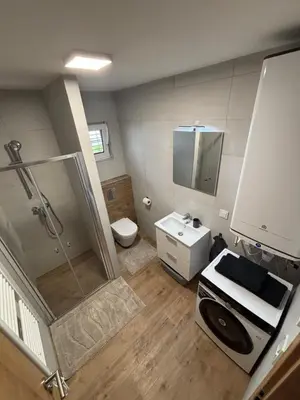 Ein Badezimmer in der Unterkunft Resort Winklfeld 6a