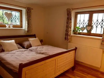 Ein Bett oder Betten in einem Zimmer der Unterkunft Ferienwohnung Obereck Natur-Ruhelage - Bad Ischl
