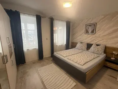 Ein Bett oder Betten in einem Zimmer der Unterkunft Luxus Apartment - Toskana Gasthaus