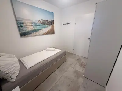 Ein Bett oder Betten in einem Zimmer der Unterkunft Luxus Apartment - Toskana Gasthaus
