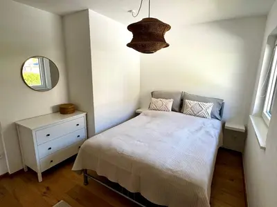 Ein Bett oder Betten in einem Zimmer der Unterkunft Bergpanorama