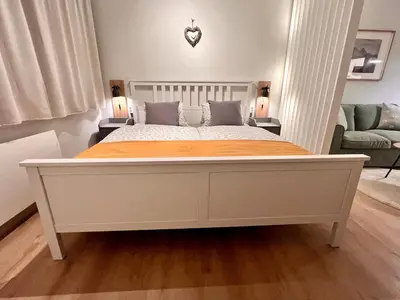 Ein Bett oder Betten in einem Zimmer der Unterkunft Gosau Apartment 202