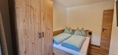 Ein Bett oder Betten in einem Zimmer der Unterkunft Griesbauer Familie Gehwolf