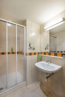 Ein Badezimmer in der Unterkunft JUFA Hotel Spital am Pyhrn