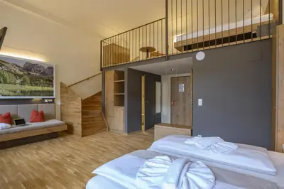 Ein Bett oder Betten in einem Zimmer der Unterkunft JUFA Hotel Spital am Pyhrn