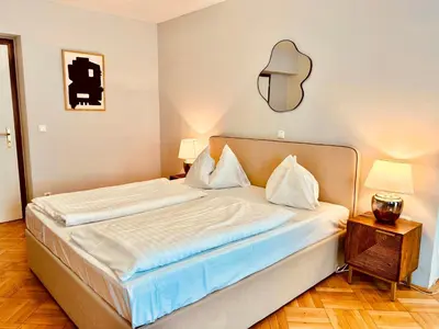 Ein Bett oder Betten in einem Zimmer der Unterkunft Apartment am Stadtpark