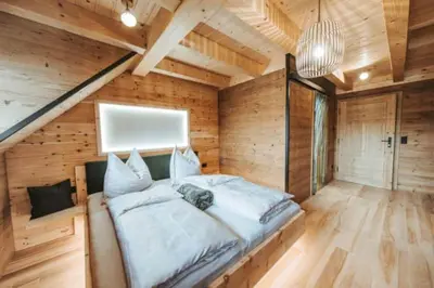 Ein Bett oder Betten in einem Zimmer der Unterkunft Mariandl Alm