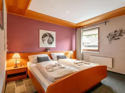 Ein Bett oder Betten in einem Zimmer der Unterkunft Tauernnest