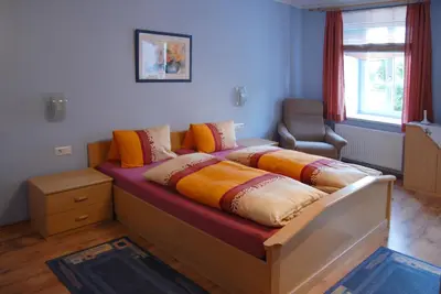 Ein Bett oder Betten in einem Zimmer der Unterkunft Ferienwohnungen Primoschitz