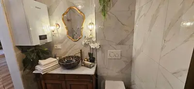 Ein Badezimmer in der Unterkunft Sisi's Loft - Imperial Charm