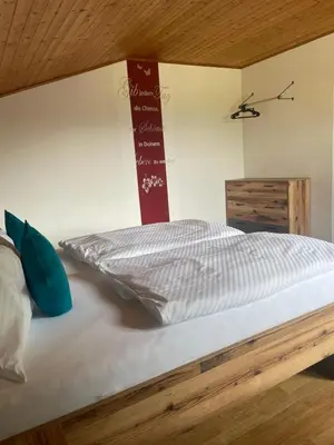 Ein Bett oder Betten in einem Zimmer der Unterkunft Ferienhaus Rotenbichler