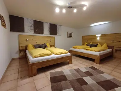 Ein Bett oder Betten in einem Zimmer der Unterkunft Ferienhaus-Birgit-Gerald-Reinbacher