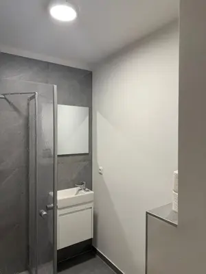 Ein Badezimmer in der Unterkunft ALS Zimmer & Suiten