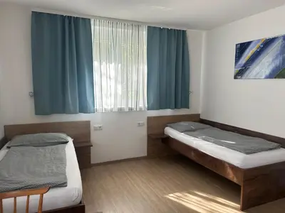Ein Bett oder Betten in einem Zimmer der Unterkunft FarawayHomes Aparthotel Krems