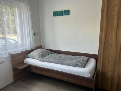 Ein Bett oder Betten in einem Zimmer der Unterkunft FarawayHomes Aparthotel Krems