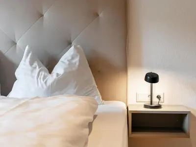Ein Bett oder Betten in einem Zimmer der Unterkunft Eden Kleinbichl Top 7