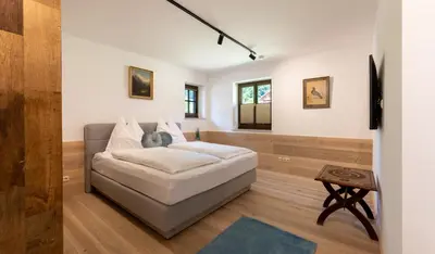Ein Bett oder Betten in einem Zimmer der Unterkunft Promegggut