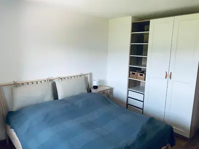 Ein Bett oder Betten in einem Zimmer der Unterkunft Tolle Wohnung mit Seeblick