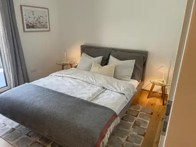 Ein Bett oder Betten in einem Zimmer der Unterkunft Alpine Retreat