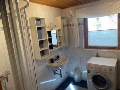 Ein Badezimmer in der Unterkunft Haus Bergblick