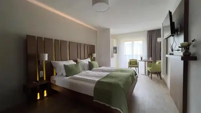 Ein Bett oder Betten in einem Zimmer der Unterkunft Apartmenthotel 's Mitterndorf