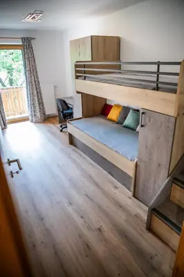 Ein Bett oder Betten in einem Zimmer der Unterkunft Appartement am Moserhof