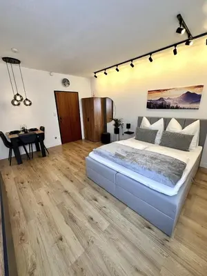 Ein Bett oder Betten in einem Zimmer der Unterkunft City Apartment Bad Aussee