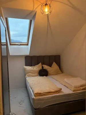 Ein Bett oder Betten in einem Zimmer der Unterkunft SC Apartments Bad Goisern - contactless check in