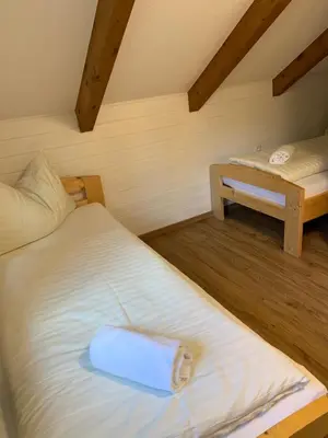 Ein Bett oder Betten in einem Zimmer der Unterkunft Riegleralm