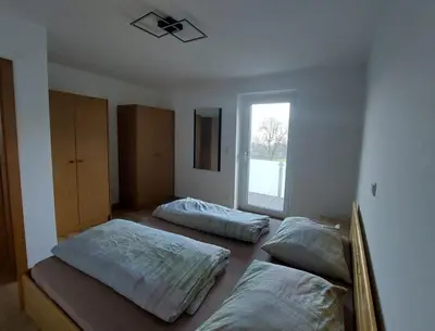 Ein Bett oder Betten in einem Zimmer der Unterkunft BergSeeZauber