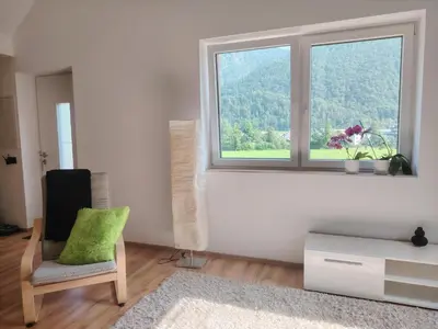 Ein Sitzbereich in der Unterkunft Suite Orchidee - SalzkammerNest