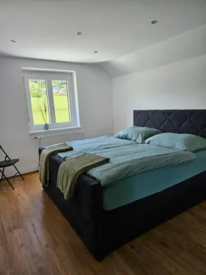 Ein Bett oder Betten in einem Zimmer der Unterkunft Appartement Traunsteinblick