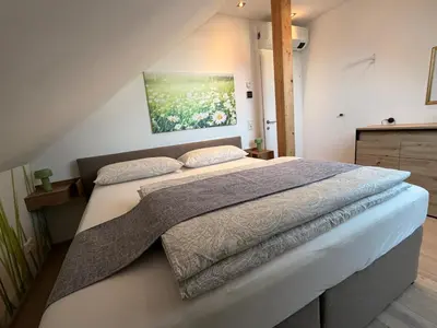 Ein Bett oder Betten in einem Zimmer der Unterkunft Ferienwohnung Moser