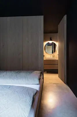 Ein Bett oder Betten in einem Zimmer der Unterkunft haus und hof - Design Apartments im Salzkammergut