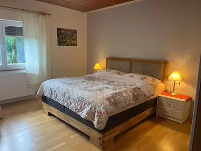 Ein Bett oder Betten in einem Zimmer der Unterkunft Ferienwohnungen zum Attersee