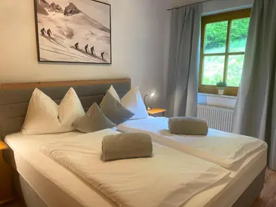 Ein Bett oder Betten in einem Zimmer der Unterkunft Chalet Zauberflöte