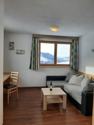 Ein Sitzbereich in der Unterkunft Bauernhof Burglehen
