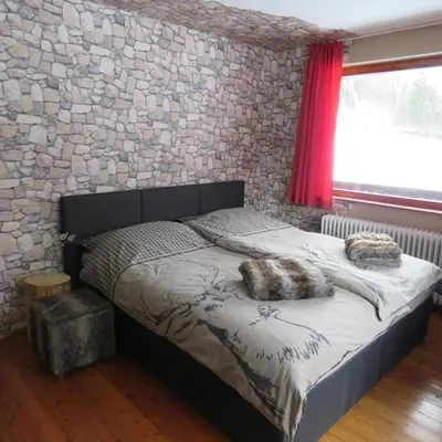 Ein Bett oder Betten in einem Zimmer der Unterkunft Haus Bergblick