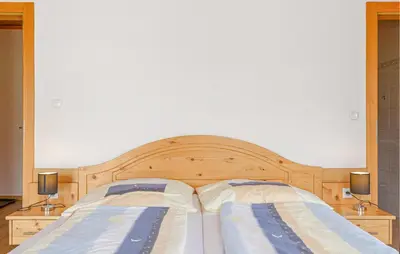 Ein Bett oder Betten in einem Zimmer der Unterkunft Ferienwohnung Schöder