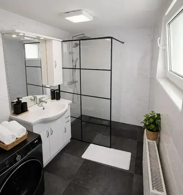 Ein Badezimmer in der Unterkunft Gemütliches Haus für Familien bis zu 7 Personen mit Parkplatz und ruhiger Lage