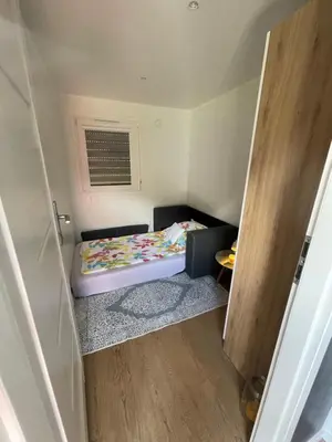 Ein Bett oder Betten in einem Zimmer der Unterkunft Premium Chalet A