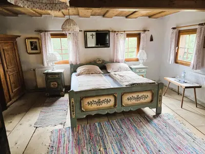 Ein Bett oder Betten in einem Zimmer der Unterkunft 400 year old wooden house