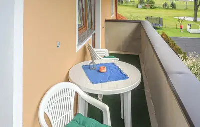 Ein Balkon oder eine Terrasse in der Unterkunft Cozy Apartment In Kleinarl With Wifi
