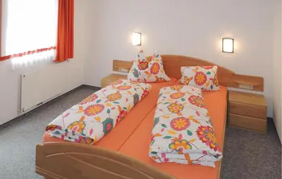 Ein Bett oder Betten in einem Zimmer der Unterkunft Cozy Apartment In Kleinarl With Wifi